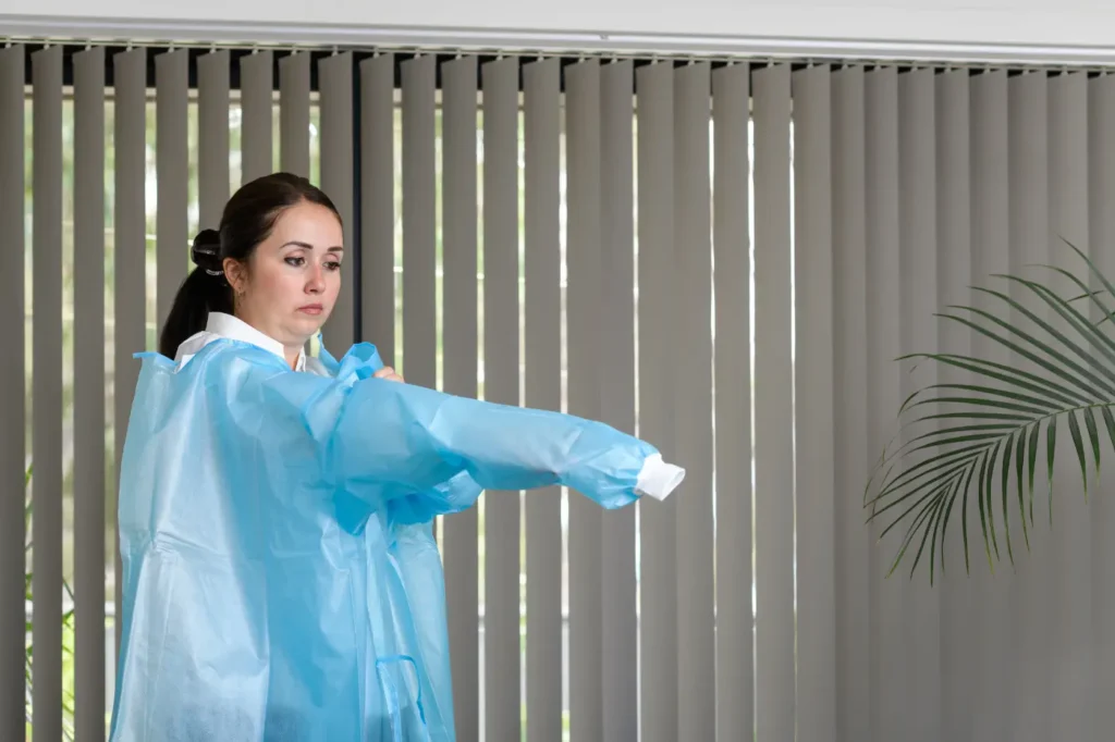 Culinary PPE worn by workers in a commercial food plant to ensure food safety and hygiene.