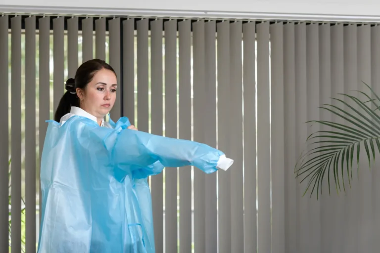 Culinary PPE worn by workers in a commercial food plant to ensure food safety and hygiene.